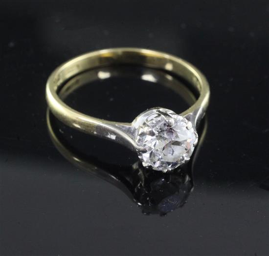 A 1980s 18ct gold and solitaire diamond ring, size R.